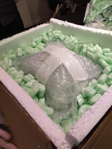 Small objects: wrapped, cushioned, lined box