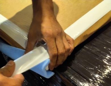Framed work: foam corner protection and taped edges